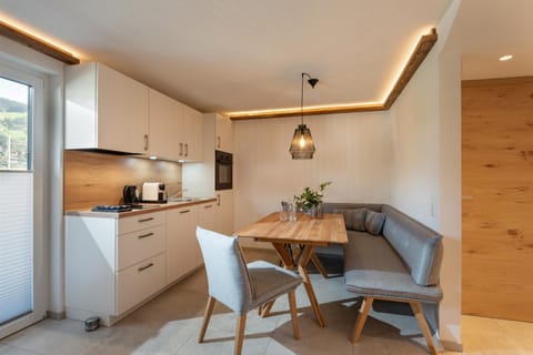 Kitchen or kitchenette, Living room, Seating area, Dining area, stove