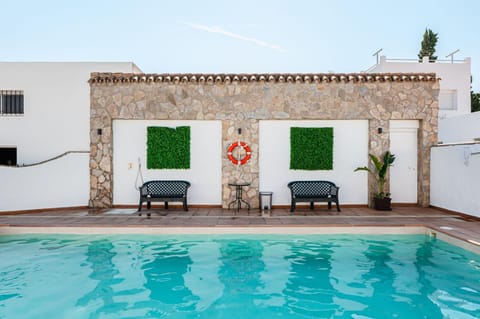 Property building, Living room, Swimming pool