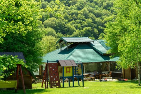 Restaurant/places to eat, Children play ground, Living room, Garden view