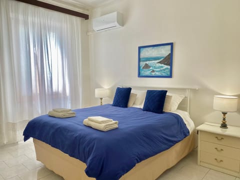 Bed, Photo of the whole room, Bedroom, towels, air conditioner