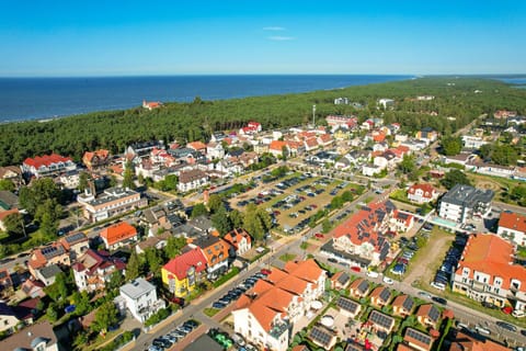 Property building, Day, Neighbourhood, Natural landscape, Bird's eye view, City view, Sea view, Street view, Location