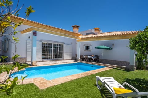 Property building, Living room, Swimming pool