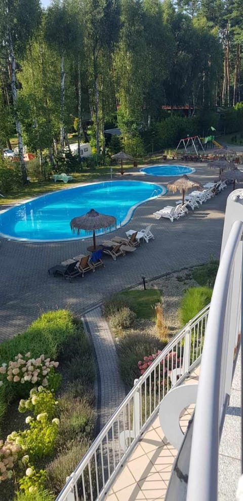 Romantyczny Apartament HAPPY 16 BASEN & KORT TENISOWY, OCHRONA 24 h - dla maksymalnie 6 osób Apartment in West Pomeranian Voivodeship, Poland