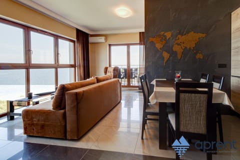 Kitchen or kitchenette, Living room, Dining area, Sea view