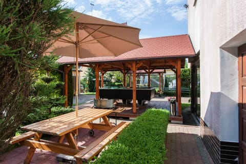 Property building, Patio, Garden, Seating area, Garden view