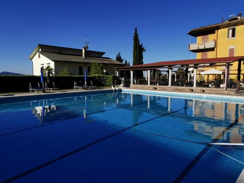 Property building, Pool view, Swimming pool, sunbed