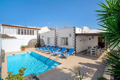 Property building, Living room, Swimming pool