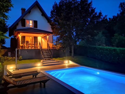 Property building, Swimming pool, Sunset