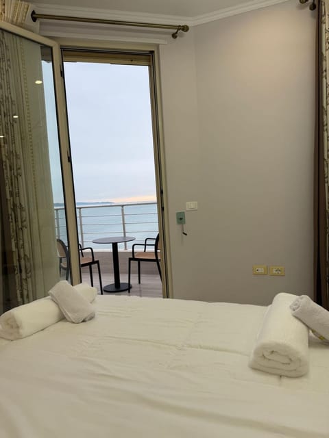 Bed, Bedroom, Sea view, towels