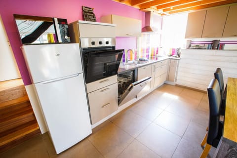 Kitchen or kitchenette, dishwasher, oven, stove, toaster