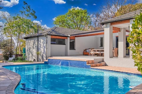 Property building, Patio, Spring, Day, Pool view, Swimming pool, sunbed
