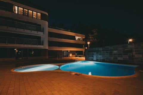 Property building, Night, Pool view, Swimming pool