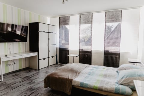 Communal lounge/ TV room, Bed, Photo of the whole room, Bedroom, wardrobe