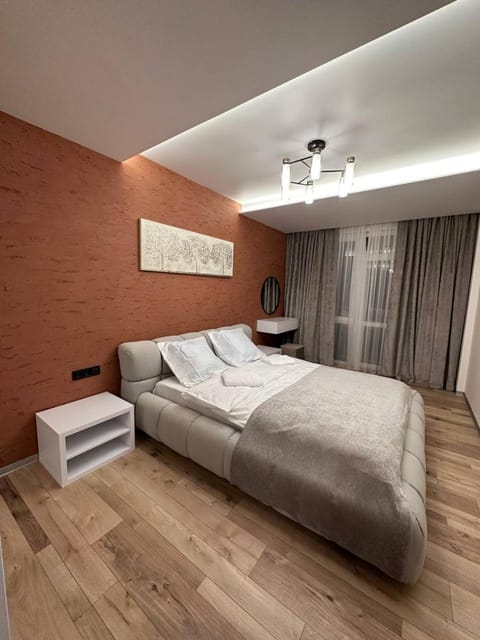Bed, Living room, Seating area, Bedroom
