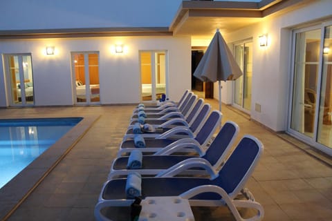 Property building, Swimming pool, Sunset