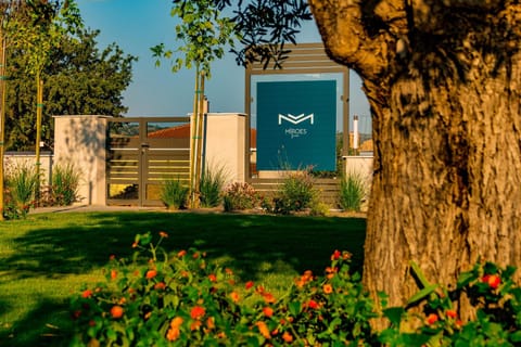 Patio, Facade/entrance, Property logo or sign, Text overlay, Family