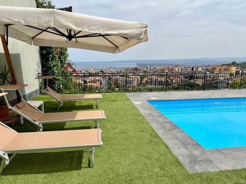 Property building, View (from property/room), City view, Swimming pool