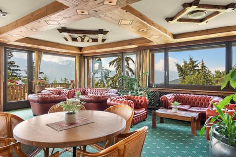 Living room, Banquet/Function facilities, Seating area, Mountain view, River view, River view