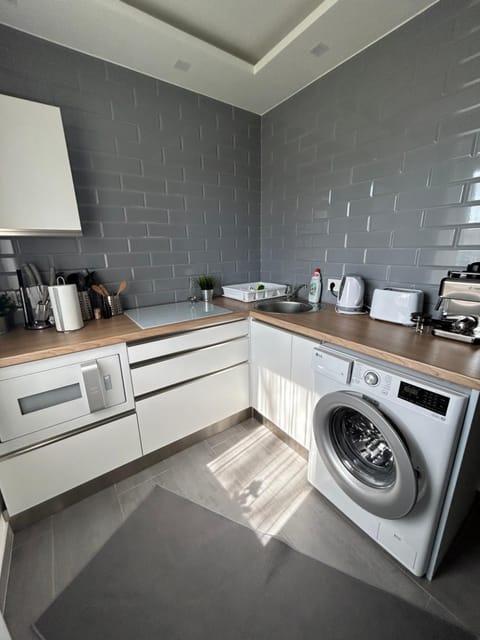 Coffee/tea facilities, Kitchen or kitchenette, minibar, stove, toaster, washing machine