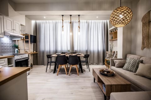 Kitchen or kitchenette, Living room, Seating area, Dining area