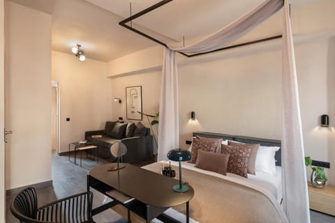 Bed, Living room, Seating area, hair dresser