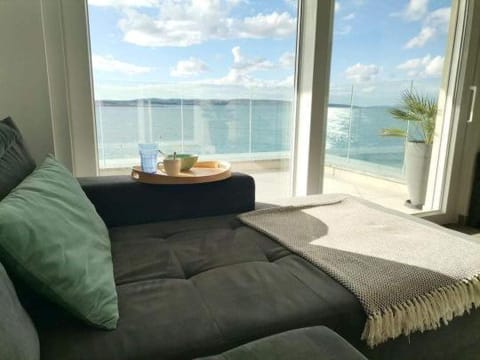 View (from property/room), Balcony/Terrace, Living room, Seating area, Sea view