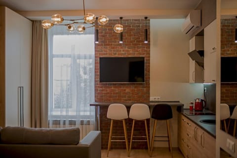 TV and multimedia, Living room, Photo of the whole room, Decorative detail, Seating area, Dining area