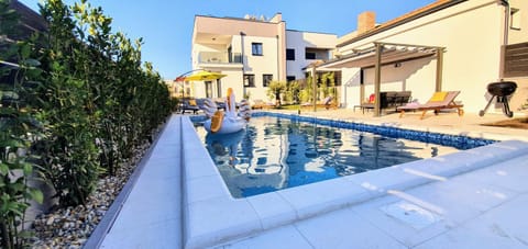 Facade/entrance, Garden, Balcony/Terrace, Swimming pool