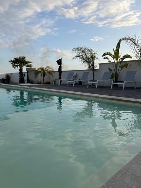 Day, Pool view, Swimming pool, sunbed