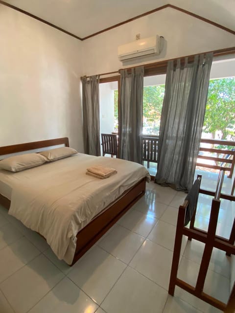 Bed, Balcony/Terrace, Bedroom, storage, towels, air conditioner