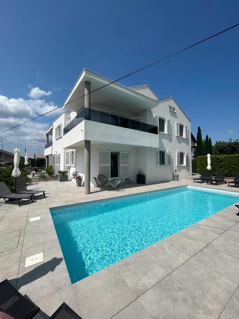 Property building, Patio, Pool view, Swimming pool