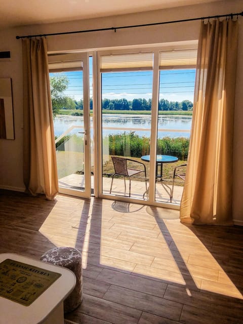 Day, Natural landscape, View (from property/room), Balcony/Terrace, Living room, Seating area, Lake view