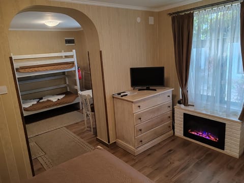 Photo of the whole room, bunk bed, fireplace