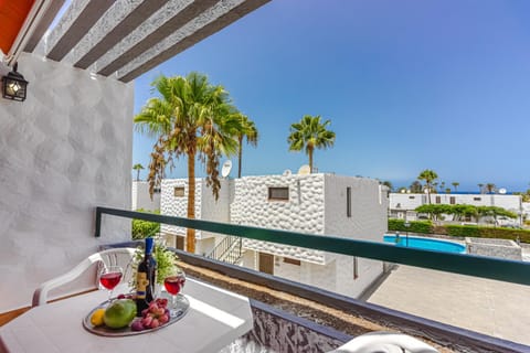Property building, Patio, Day, View (from property/room), Balcony/Terrace, Balcony/Terrace, Dining area, Pool view