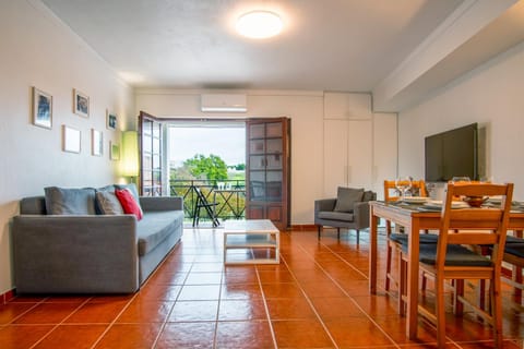 View (from property/room), Living room, Seating area, Dining area, air conditioner