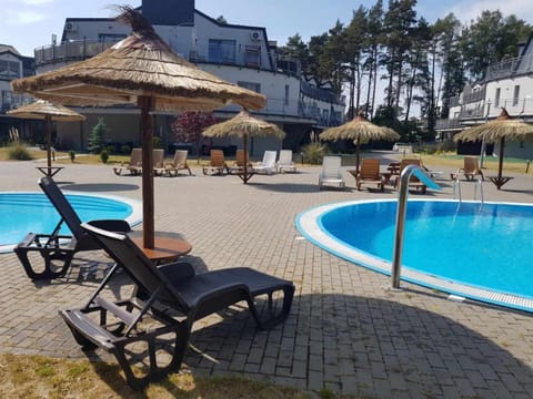 Apartament HAPPY A12 - BASENY & KORT TENISOWY, PLAC ZABAW, OCHRONA 24h Apartment in West Pomeranian Voivodeship, Poland