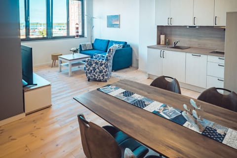 Kitchen or kitchenette, Living room, Seating area, Dining area