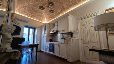 Kitchen or kitchenette, Living room, Photo of the whole room, Seating area, dishwasher, oven, stove