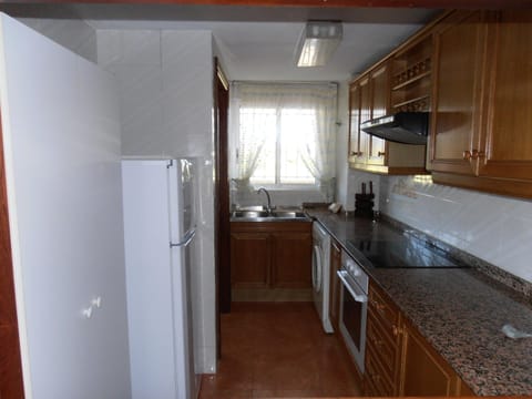 Kitchen or kitchenette, oven