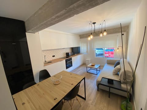 TV and multimedia, Kitchen or kitchenette, Living room, Seating area, Dining area