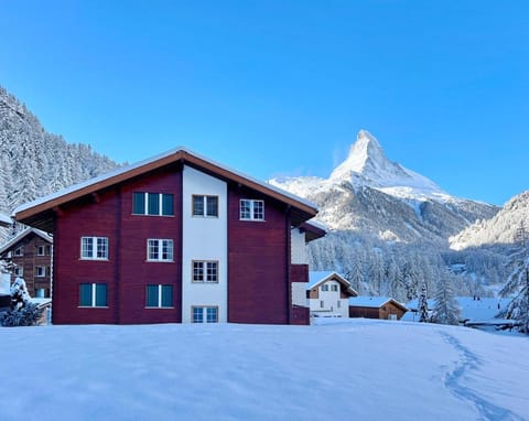 Property building, Nearby landmark, Natural landscape, Winter