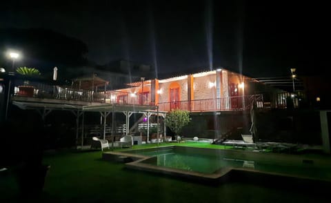 Property building, Night, Pool view, Swimming pool