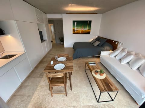 Bed, Living room, Seating area, Dining area, Bedroom