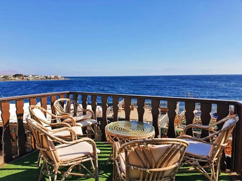 View (from property/room), Balcony/Terrace, Seating area, Sea view