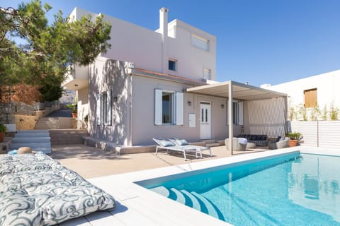 Property building, Living room, Seating area, Swimming pool, sunbed