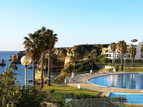 Property building, Natural landscape, Bird's eye view, Beach, Swimming pool