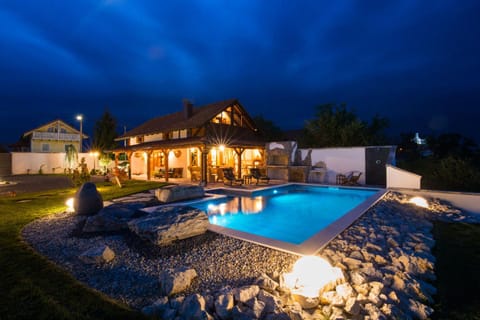 Property building, Night, BBQ facilities, Garden, View (from property/room), Balcony/Terrace, Pool view, Swimming pool