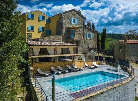 Property building, Patio, Natural landscape, Pool view, Swimming pool