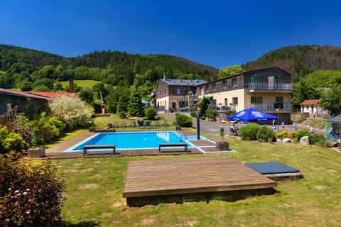 Property building, View (from property/room), Swimming pool, children, children, children, young children, young children, young children, older children