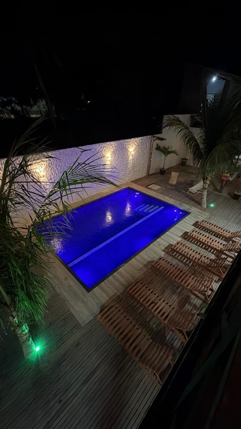 Property building, Night, Pool view, Swimming pool, sunbed
